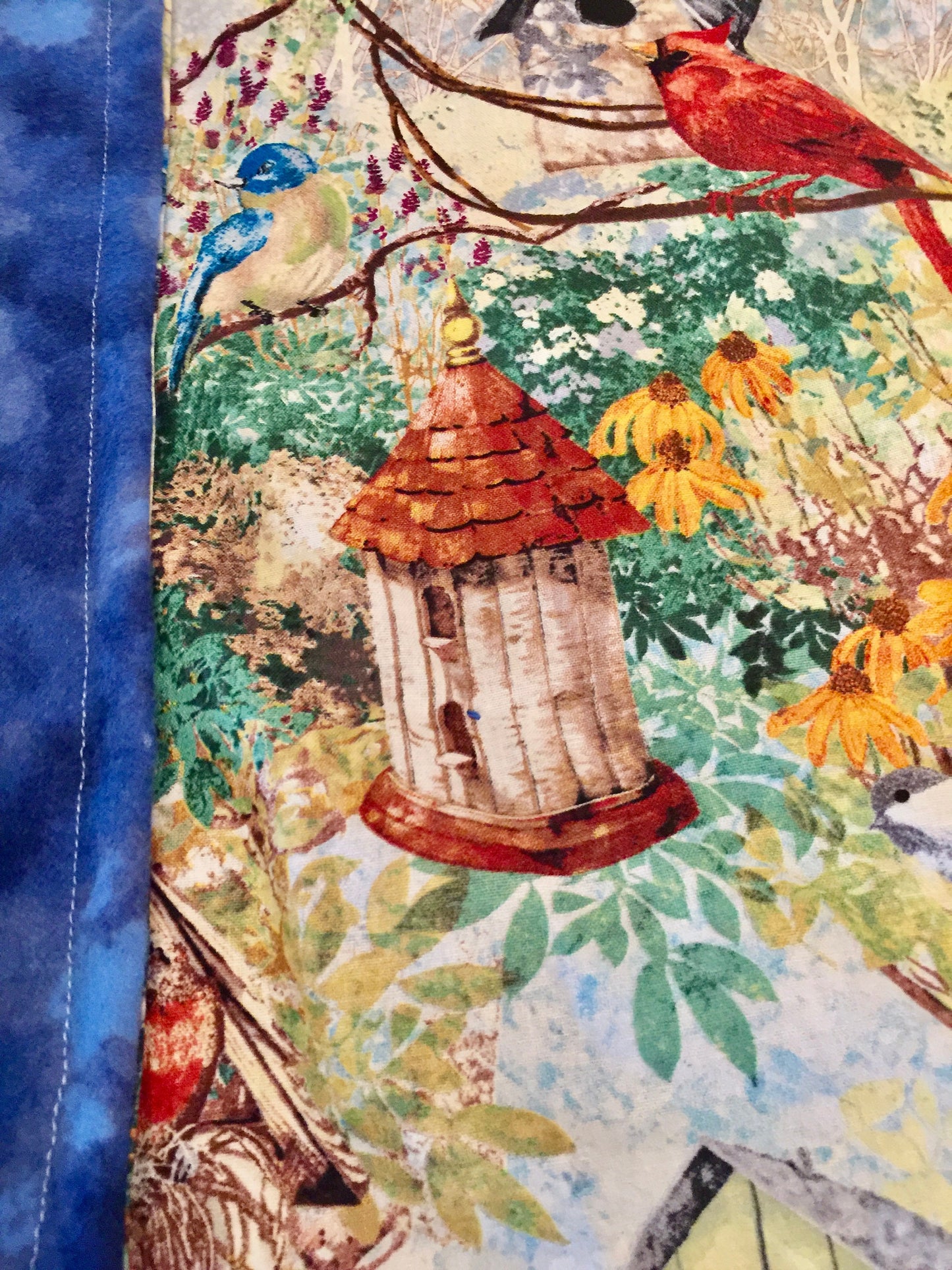 Beautiful birds, birdhouses and garden blanket