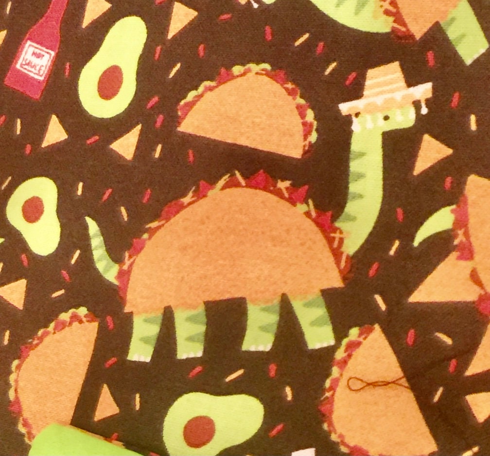 Love Tacos? Love Dinosaurs? Then this is your ultimate cool blanket!