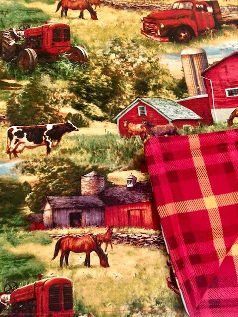 Beautiful reversible Farm and Country lap quilt