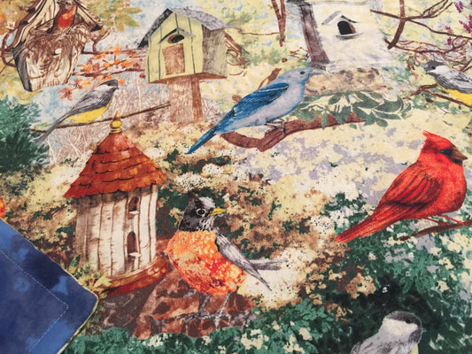 Beautiful birds, birdhouses and garden blanket
