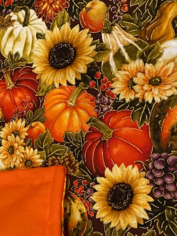 Beautiful rich fall blanket featuring pumpkins and sunflowers