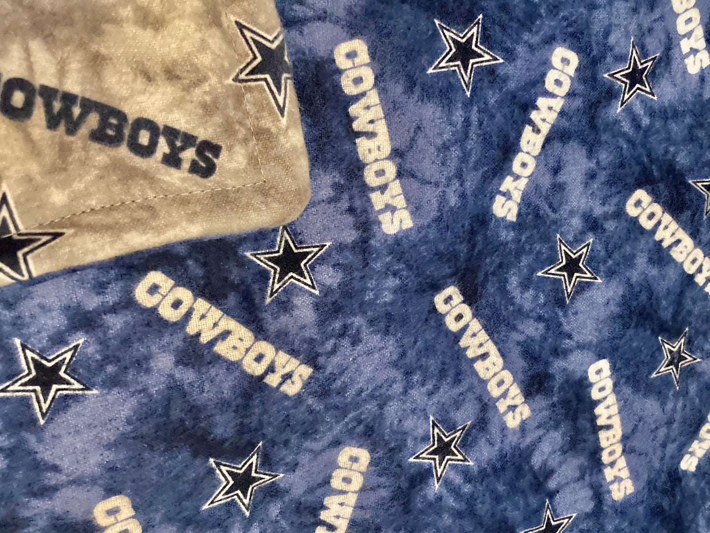 Perfect Dallas Cowboy warm and luxurious reversible blanket!