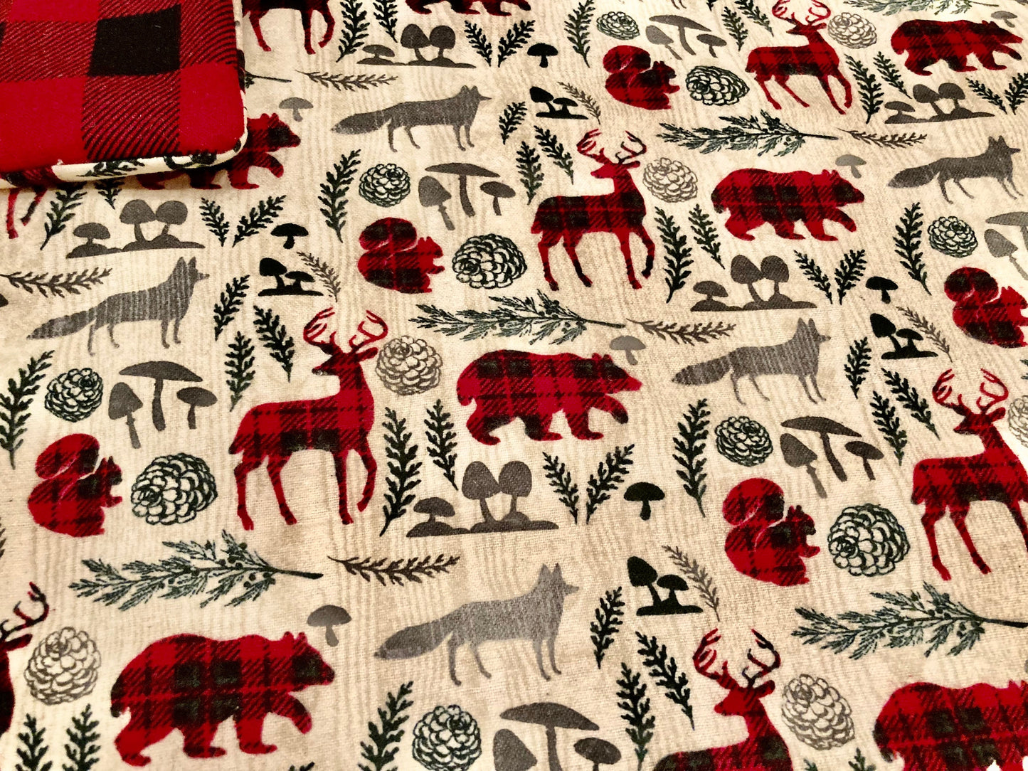 Must have cozy, warm cabin blanket with plaid, deer, bears and more