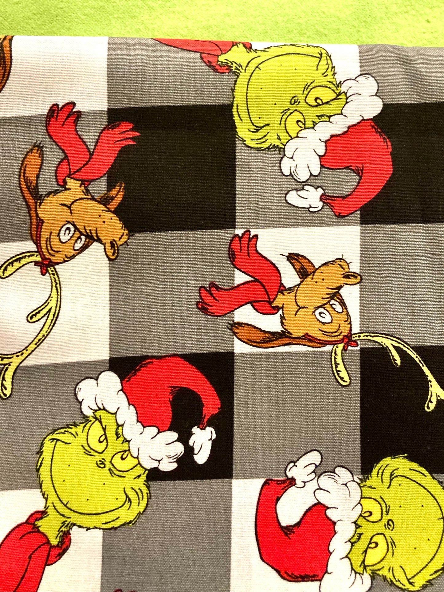 The best Grinch designer plaid reversible blanket ever!